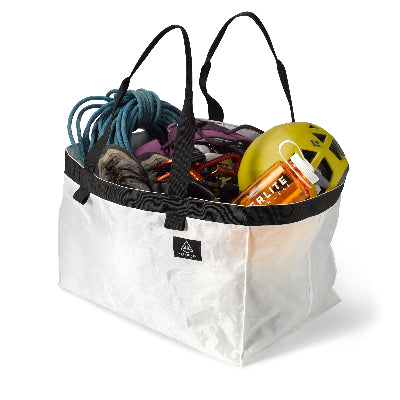 Front view of Hyperlite Mountain Gear's G.O.A.T. Tote in White filled with hiking gear
